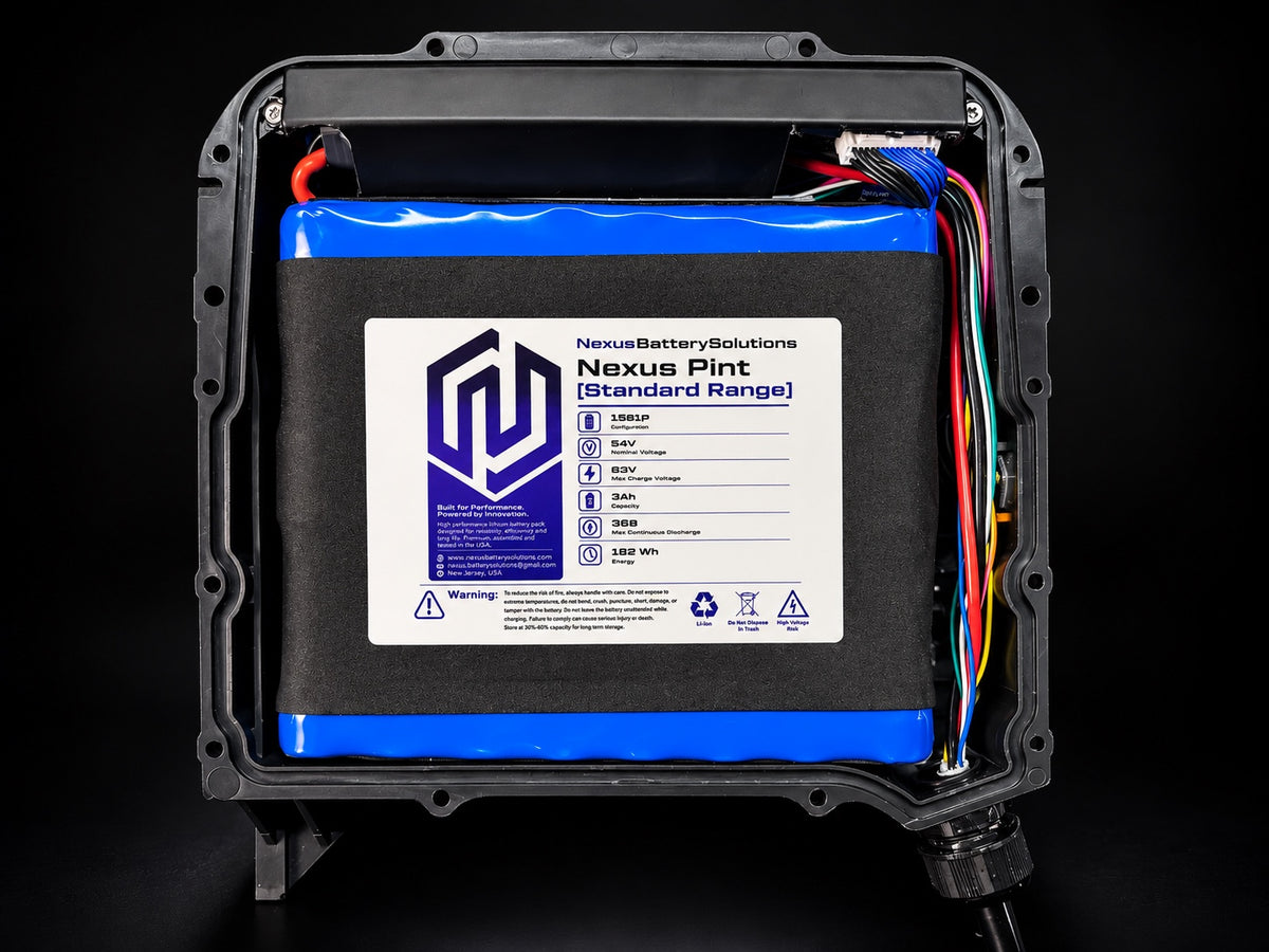 Nexus Pint Standard Range JP30 battery installed in enclosure on black studio background