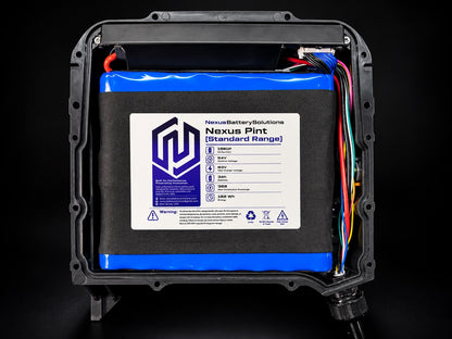 Nexus Pint Standard Range JP30 battery installed in enclosure on black studio background