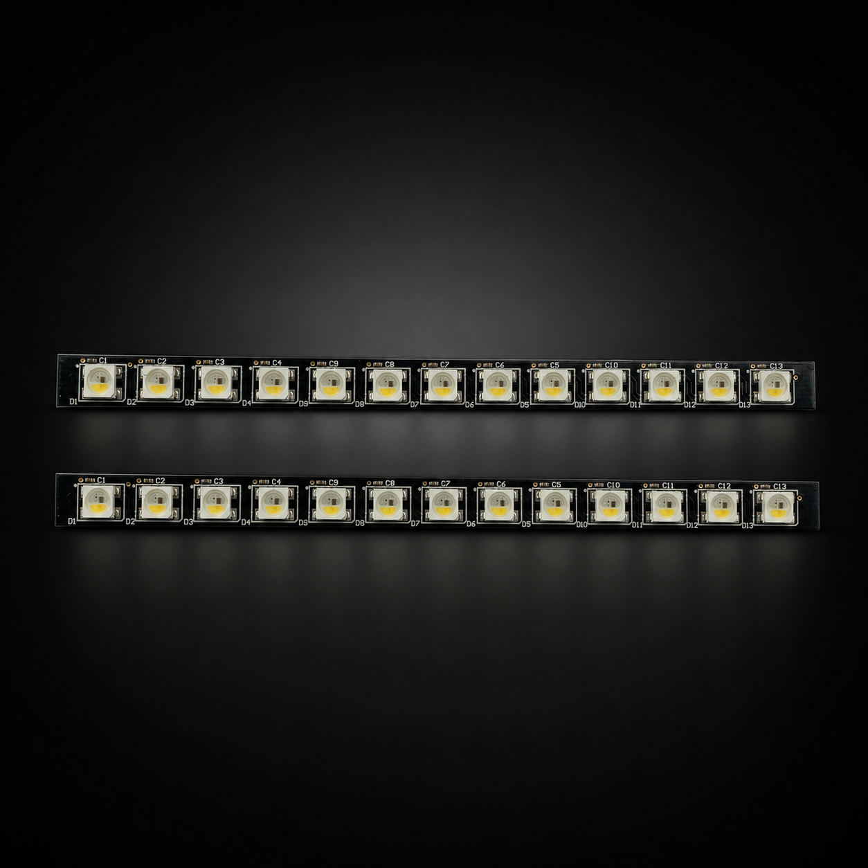 2 pack Onewheel PINT LEDs WRGB(5v) VESC on a black studio background