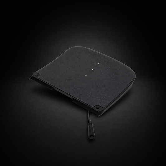 Pint footpad on a black studio background
