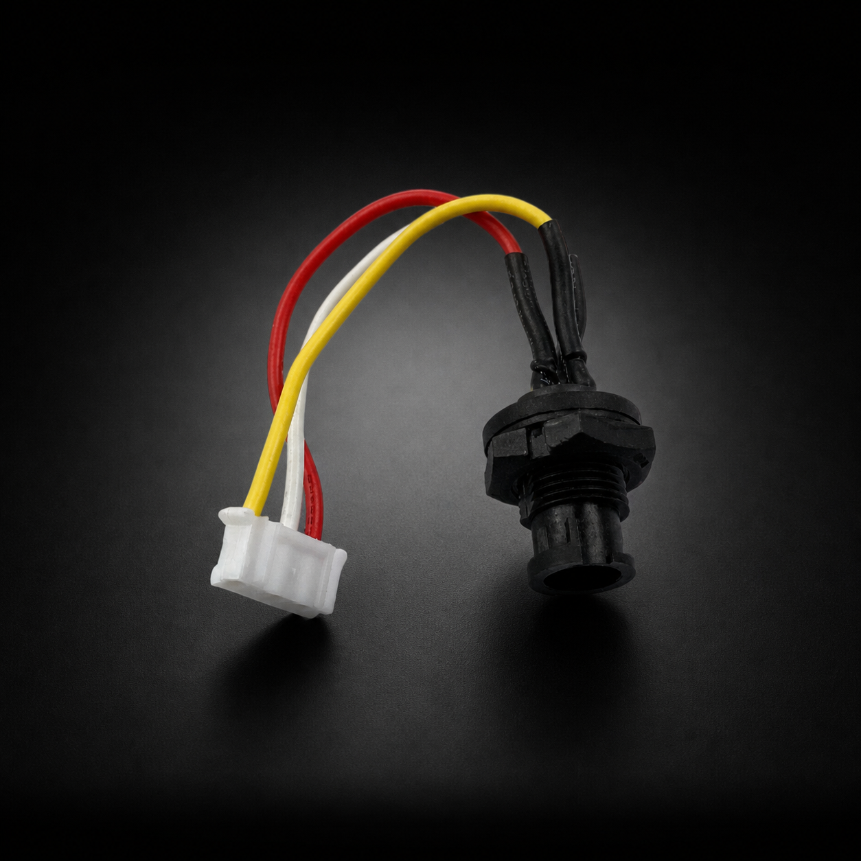 Stock Pint footpad connector on a black studio background